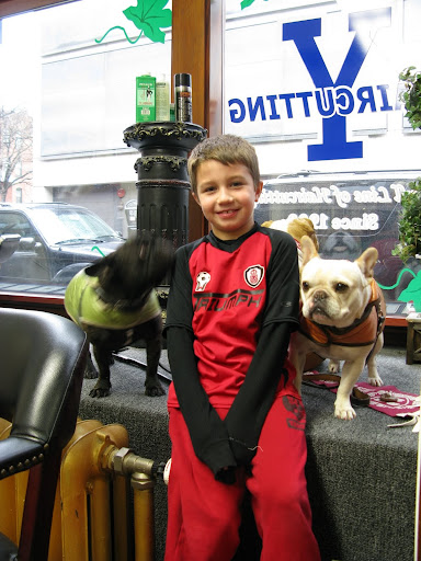 We asked this boy if we French bulldogs could also be mascots.  He laughed and said not to worry - we were already Martha Stewart's mascots.