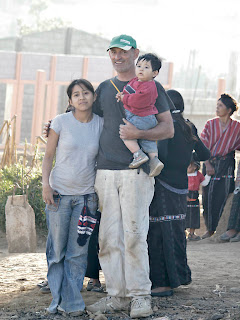 Erica, Derek and Erica's son. Erica is the daughter of a friend of Derek's who helped Laura, Derek's wife, with the cooking on the job site. Photos by TOM HART
