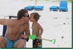Ty and daddy kiss