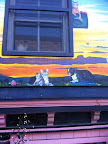 You can see one of the lucky kitties they've helped in the window.  They have a large cageless facility we wanted to see but it was closed :( when we got there.