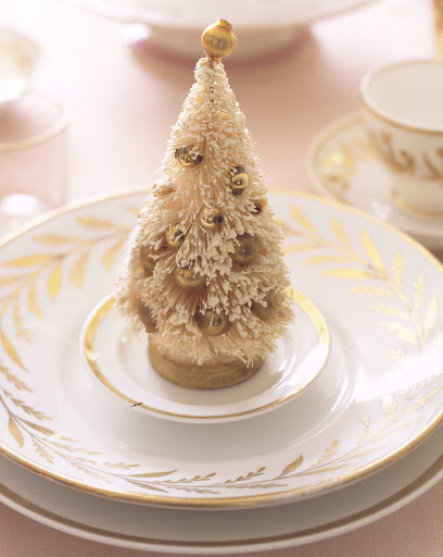 Having a snowy tree decorated with golden ornaments is the perfect touch to your table top. Having a snowy tree decorated with golden ornaments is the perfect touch to your table top.