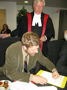 Ben signs his oath of office to assume his seat as CRD Director, December 2011
