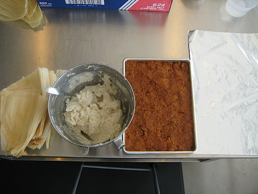 The process is easier if you set up your ingredients in an assembly line fashion in the order that you will be using them. Corn husks, prepared dough, filling and foil.