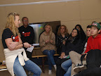 Åse Sternesjö från SLU diskuterar med gymnasieelever efter ett föredrag om vad man gör med mjölken i ett mejeri. ForskarFredag på Skansen 2011. Foto: Sofia Ljungman, SLU