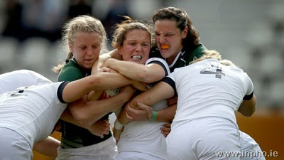 2014 Women's Rugby World Cup Semi-Final, Stade Jean Bouin, Paris, France 13/8/2014<br />Ireland vs England<br />Ireland's Claire Molloy and Paula Fitzpatrick tackle Jo McGilchrist of England <br />Mandatory Credit ©INPHO/Dan Sheridan