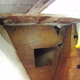 Anchor locker bulkhead - Rotten wood removed at top starbord corner. It may also be rotten at top port corner.