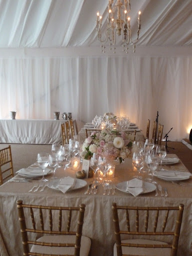 Here you can see the tent with candlelight and the chandeliers above.