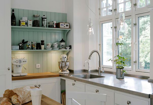 A wall of shelves stand out in this kitchen -- the different material and color are what catches my eyes. (Photographed by Stuart McIntyre) A wall of shelves stand out in this kitchen -- the different material and color are what catches my eyes. (Photographed by Stuart McIntyre)