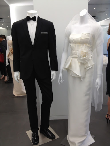 A peplum column dress is so sophisticated. It's shown with a new Vera Wang retail tux available at Men's Warehouse. The line is called Black by Vera Wang. A peplum column dress is so sophisticated. It's shown with a new Vera Wang retail tux available at Men's Warehouse. The line is called Black by Vera Wang.