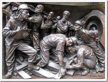 A statue depicting St Pancras station over the decades. The gangers who kept the railways moving.