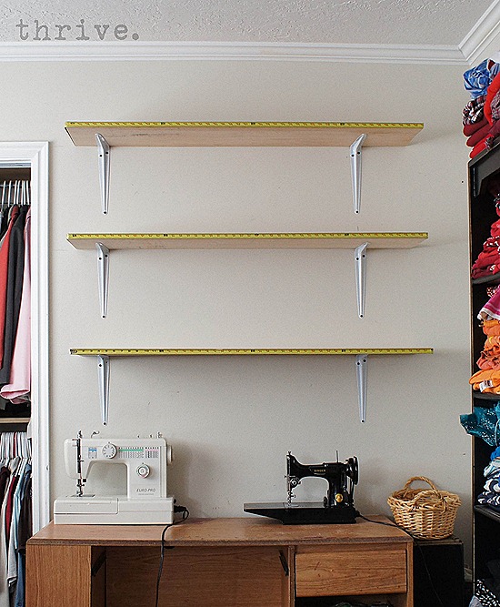 Use busted measuring tapes to decorate shelves - choosetothrive.blogspot.com