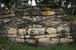 The number of outlines of eyes signify rank on the homes of the ancient Chachapoyas. At three lines, this must have been an important person, Kuelap, Chachapoyas Region, Peru