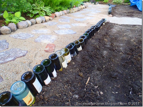 wine bottles stabilized by Organic Mechanics soil