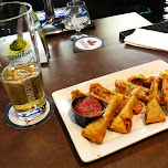 somersby beer and a pizza spring roll in Toronto, Canada 