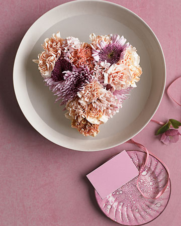 Try using carnations, mums, and hyacinths in soothing shades for this floating centerpiece.