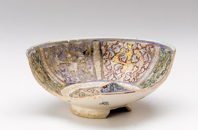 Bowl (fragmentary) | Origin:  Iran | Period: 1200-1300  Il-Khanid period | Details:  Not Available | Type: Stone-paste painted under and over glaze with lustre | Size: H: 9.0  W: 20.8  cm | Museum Code: S1987.85 | Photograph and description taken from Freer and the Sackler (Smithsonian) Museums.