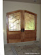Custom copper entry doors with peach and glue chip bevels in a private residence in Aptos, CA.
