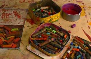 Oil pastels are a heavily used medium in Booth's paintings.