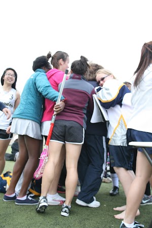 Junior Varsity coach Susan Famiglietti visits the April 22 game against North Reading. Famiglietti has been absent due to the recent lose of her husband and girls lacrosse supporter Paul. Photo by Megan Kelly. April 25 2012 Meg Kelly 085.jpg