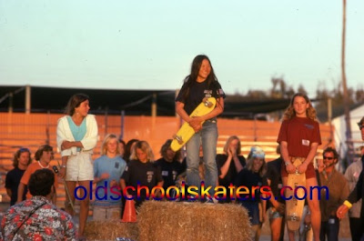 Peggy Oki on the podium at the top along with Robin on the right and the girl on the left is Michelle Brunot