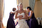 Chelsea getting zipped into her Ulla-Maija gown.