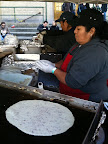 Tortillas on the grill for huaraches.
