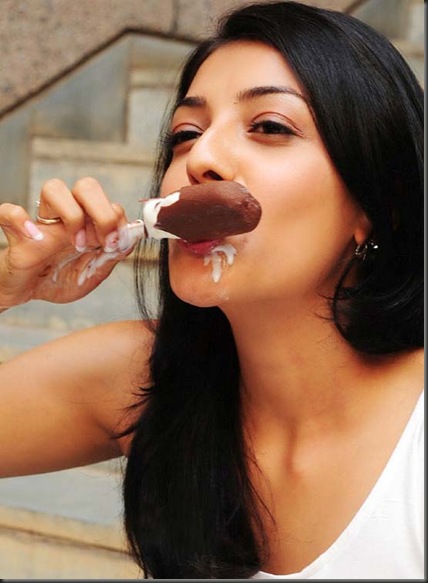 Kajal Agarwal eating choco bar