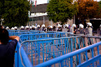 Double-rings of riot cage. Police are also well-stocked with Israeli-manufactured tear gas. The Taxi Drivers gave them a fight... lifting these cages up in the air until the gas came...