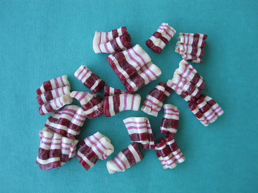 Some of the small candy ribbon out of the bag -- this flavor is mint.