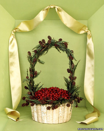 Glistening red berries shine inside a woodland basket. The base started life as a birch-bark bowl but became a basket with the addition of a pine handle. Glistening red berries shine inside a woodland basket. The base started life as a birch-bark bowl but became a basket with the addition of a pine handle.