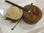 A perfect individual serving of chocolate bread pudding served with cocoa nib ice cream. A perfect individual serving of chocolate bread pudding served with cocoa nib ice cream.