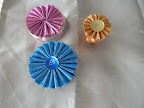 These are our medallion-topped favors, under development.