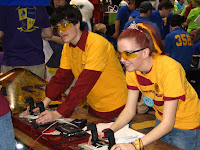 Our drivers testing the robot in the pits