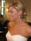 Liz wore her hair in a low, loose chignon held together with a healthy dose of hairspray. She also donned earrings by Jennifer Miller to add some sparkle. Good costume jewelry is great for traveling to destinations.