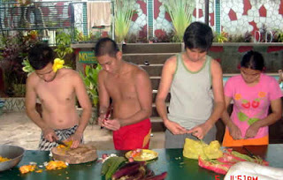 Students chopping vegetables.