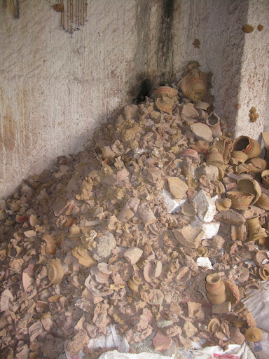 One man's trash is another man's treasure.  Bits and pieces of broken pottery inspire a perfect palette of neutrals.
