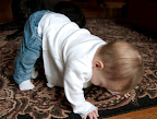Our little yoga baby doing a great version of downward facing dog.