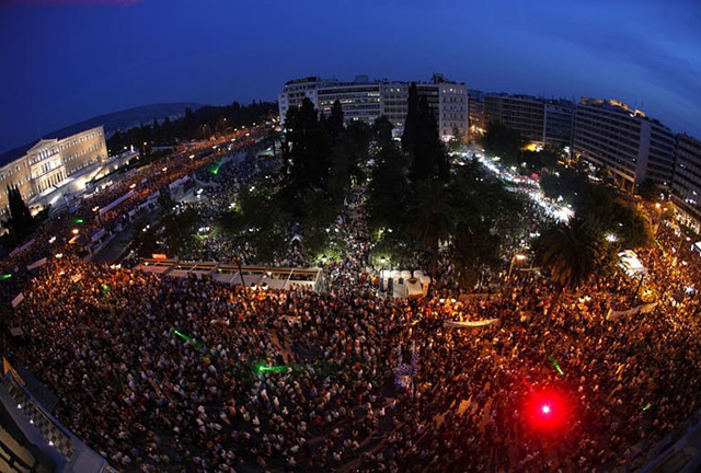 Thousands of Greeks protest outside parliament on Sunday, 6 June 2011, against a fresh austerity package agreed in return for the country&rsquo;s second bail-out in 13 months by the European Union and International Monetary Fund. via infiniteunknown.net