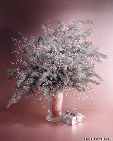 Icy dewdrops -- actually sprays of clear beads -- deliver glimmers of brightness to an arrangement of silvery faux branches. Icy dewdrops -- actually sprays of clear beads -- deliver glimmers of brightness to an arrangement of silvery faux branches.