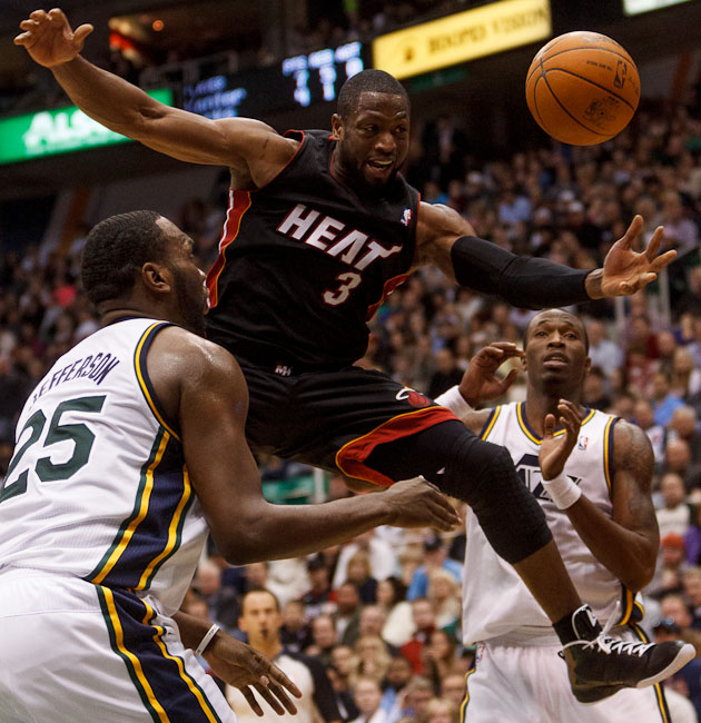 Miami's Dwayne Wade (3) loses control of the ball, defended by Utah Jazz center/forward Al Jefferson (25) and Utah Jazz forward/guard Josh Howard (8). Utah Jazz vs. Miami Heat, NBA basketball at EnergySolutions Arena Friday, March 2, 2012 in Salt Lake City, Utah. Photo by Trent Nelson/The Salt Lake Tribuneg Miami's Dwayne Wade (3) loses control of the ball, defended by Utah Jazz center/forward Al Jefferson (25) and Utah Jazz forward/guard Josh Howard (8). Utah Jazz vs. Miami Heat, NBA basketball at EnergySolutions Arena Friday, March 2, 2012 in Salt Lake City, Utah. Photo by Trent Nelson/The Salt Lake Tribune