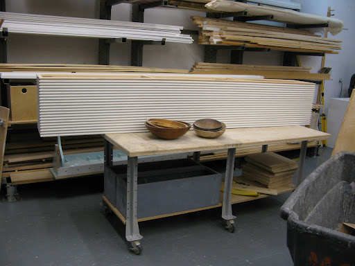 You can see the scale of the piece in relation to the bowls.