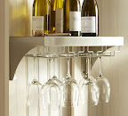 Confession: I'd drink wine with every meal if I could. I love this simple wine glass rack with room for displaying my most prized vinos. (Pottery Barn Wine Glass Shelf, $79, http://www.potterybarn.com/)