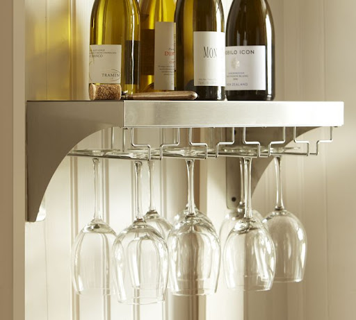 Confession: I'd drink wine with every meal if I could. I love this simple wine glass rack with room for displaying my most prized vinos. (Pottery Barn Wine Glass Shelf, $79, http://www.potterybarn.com/)