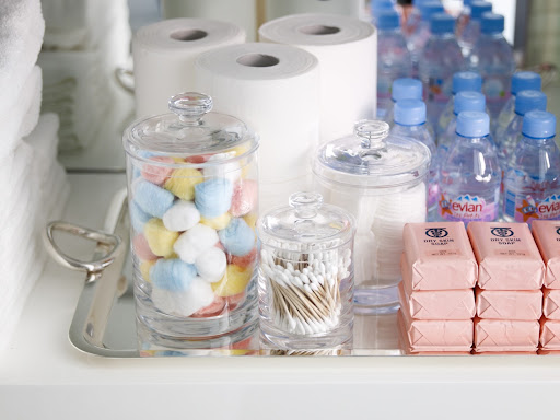 I keep my bathroom supplies on a silver tray on a shelf below my sink. I keep my bathroom supplies on a silver tray on a shelf below my sink.