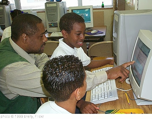 'Teacher working with kids' photo (c) 1999, breity - license: http://creativecommons.org/licenses/by-sa/2.0/