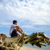 Malayo ang tingin... Hubby looking at the waters of Babu Santa Beach Resort, Talikud Island