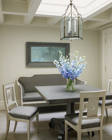 With its coffered ceiling, which conceals support beams, this room lacks the height of the rest of the apartment; the skylight, however, opens up the space.