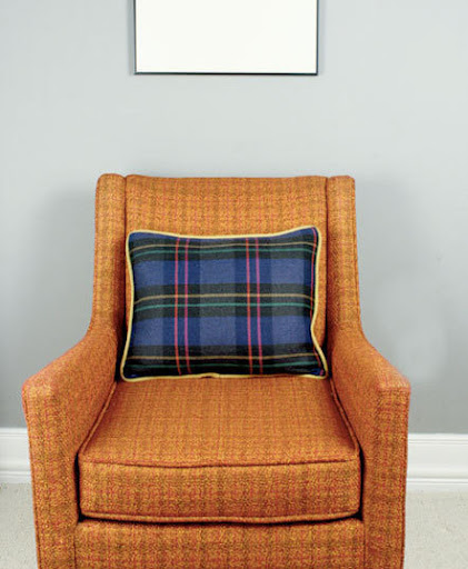 More modern colors are used to create this tartan pillow.