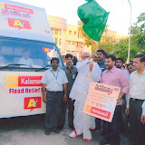 FloodReliefByFormerChiefMinisterKRosaiah