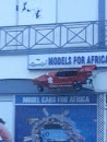 Model Car on Wall 